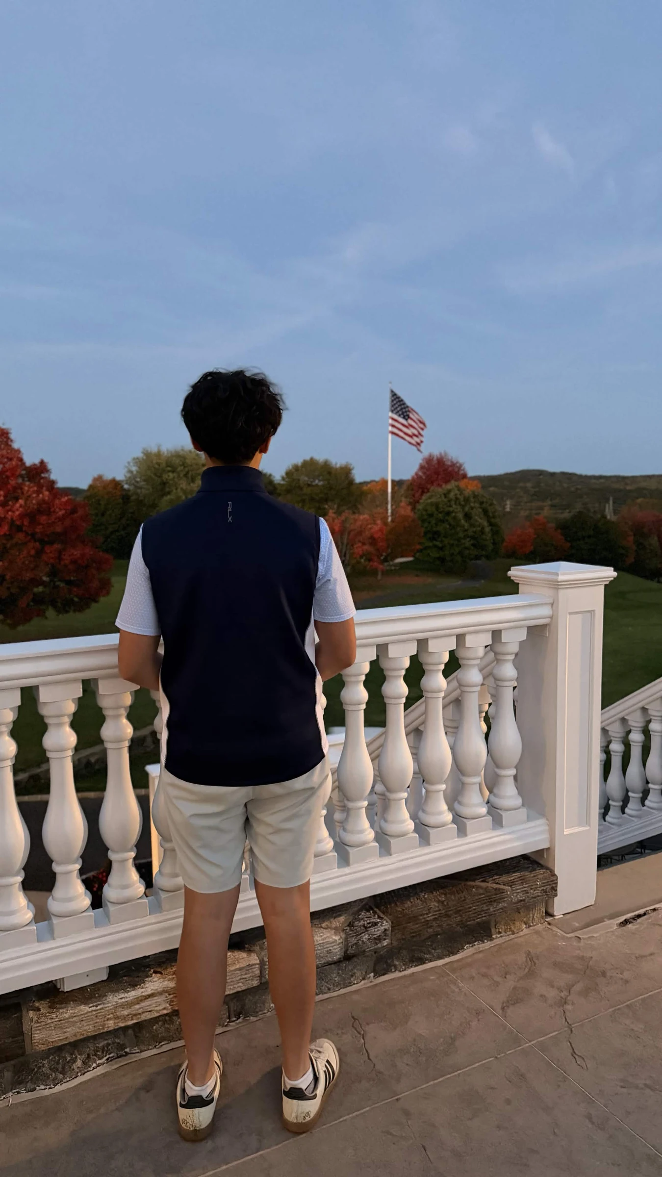 Brayden looking out over the course on an autumn afternoon