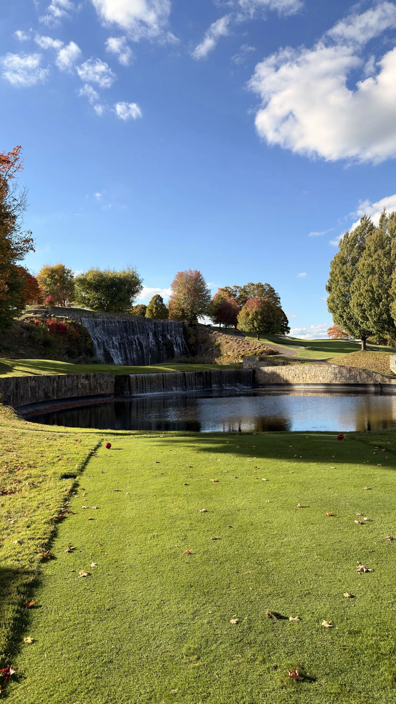 Waterfalls and a green at Trump National Golf Club Westchester